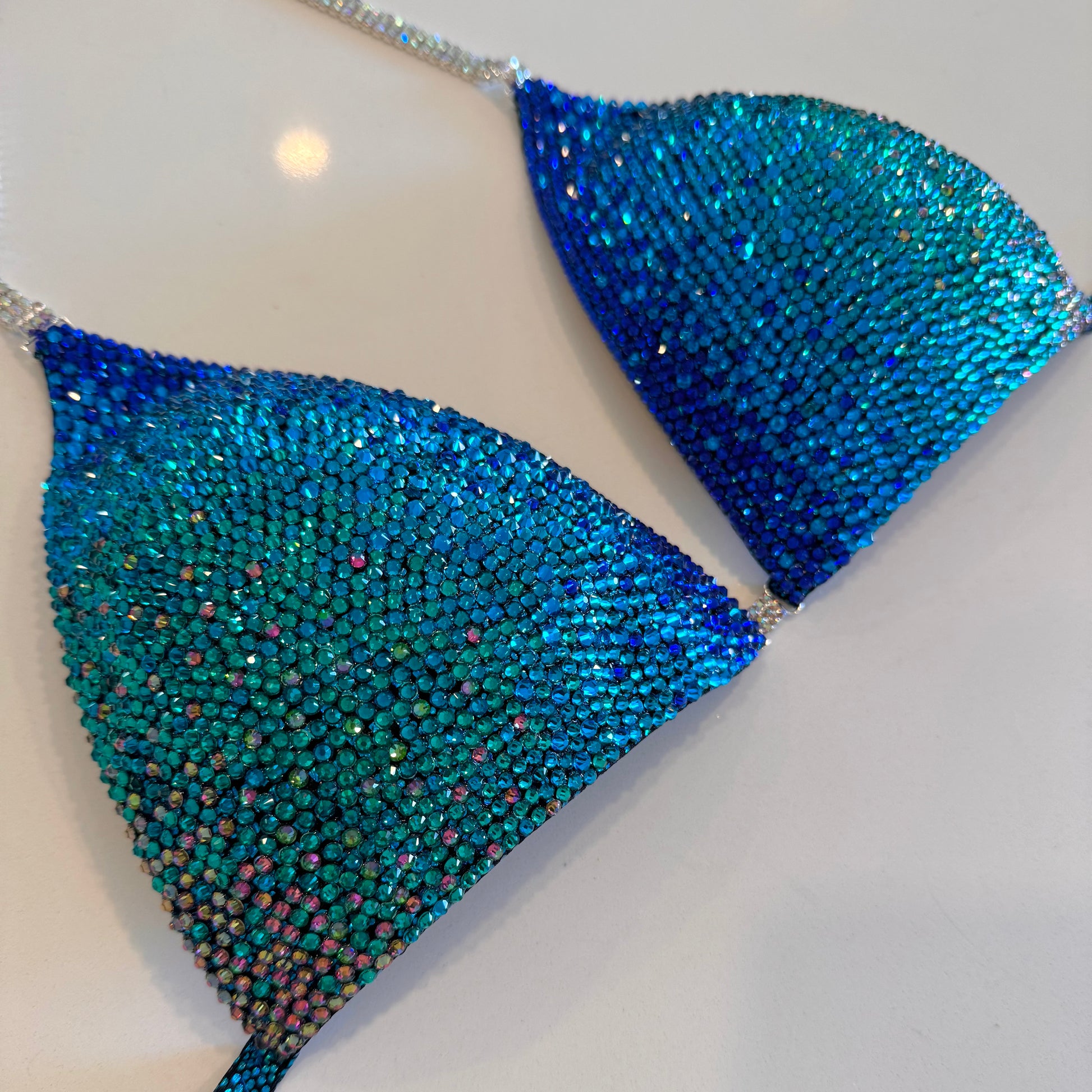 Royal blue to teal Ombré, solid stoned competition Figure suit.  NPC Denver, Colorado