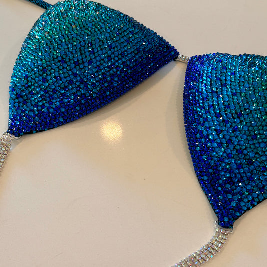 Royal blue to teal Ombré, solid stoned competition Figure suit.  NPC Denver, Colorado