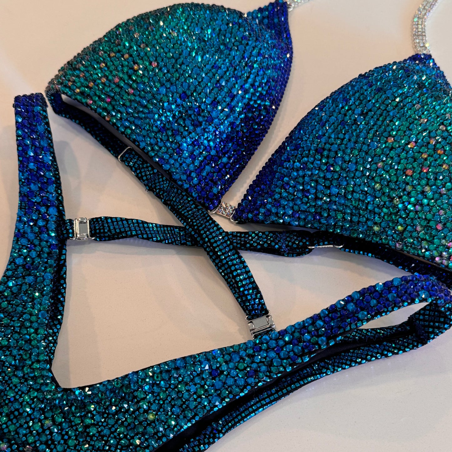 Royal blue to teal Ombré, solid stoned competition Figure suit.  NPC Denver, Colorado